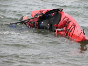 Roger Schumann demonstrating the "Setup" stage of a kayak roll.