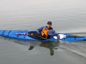 Roger Schumann in blue sea kayak.