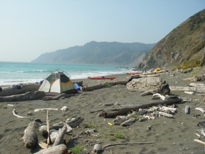 Kayakers camped on the beach.